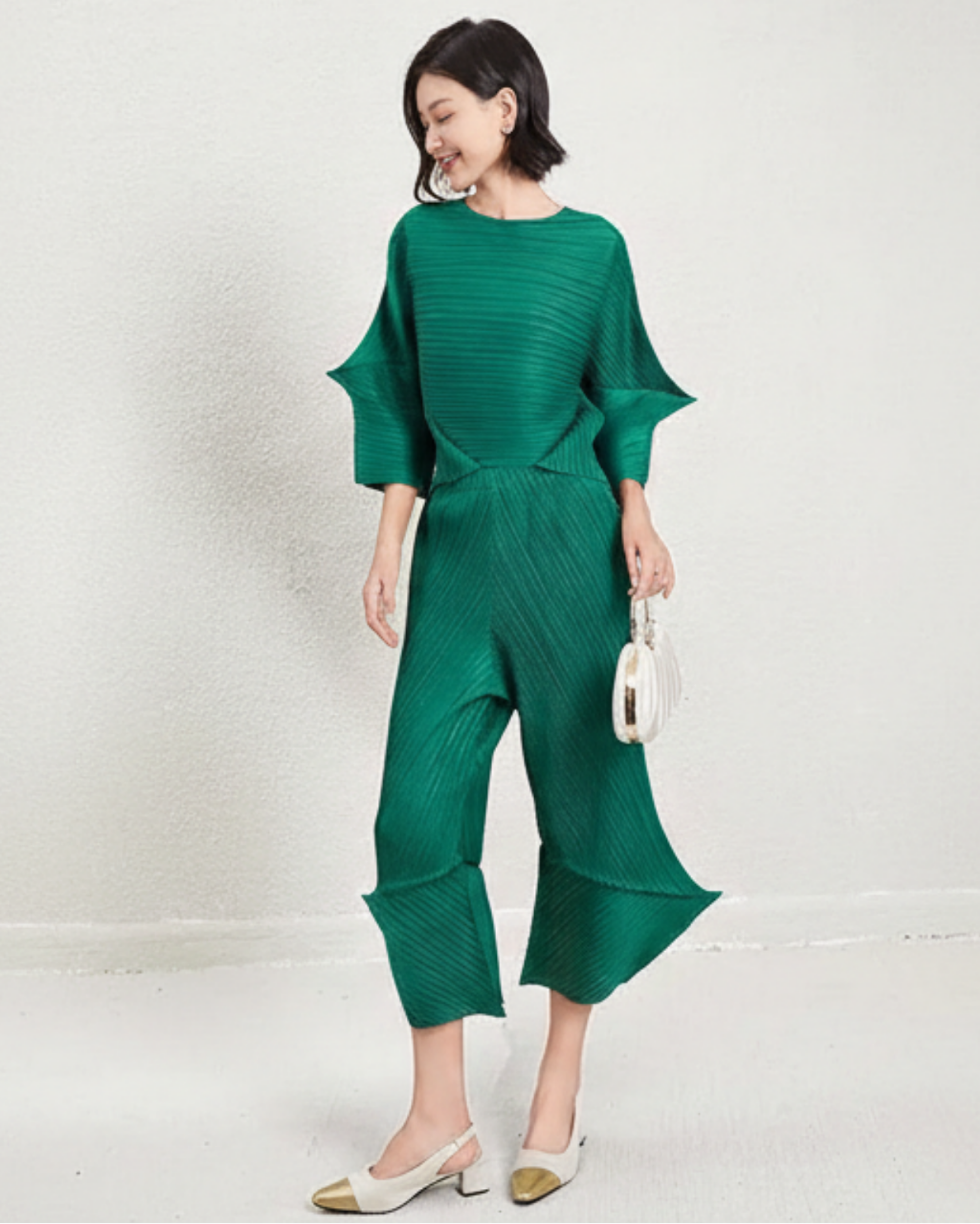 Avant-Garde Sculptural Pleated Top and Cropped Pant Set Designer