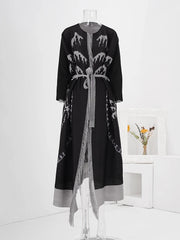 Truly Pleated Trench Coat with Tassels