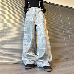 Women's Acid Washed Baggy Newspaper Print Jeans