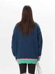 Graffiti Inspired Zippered Turtleneck Sweater