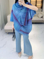Luxury Travel Plissé Poncho Top
