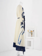 Truly Pleated Trench Coat with Tassels